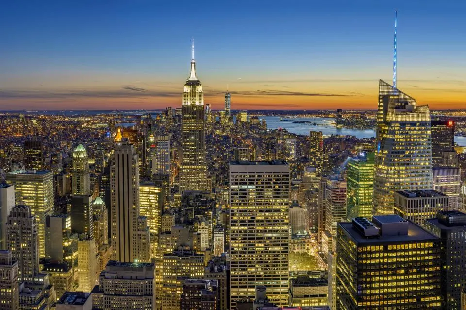 The Manhattan skyline at dusk seen across the Hudson River from the New Jersey waterfront